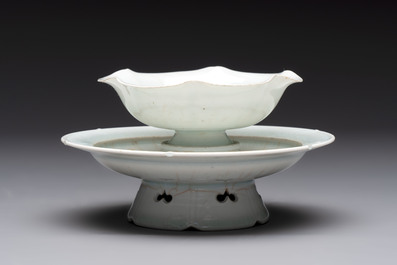 A pair of Chinese qingbai 'crane' plates and a tea bowl with stand, Song/Yuan