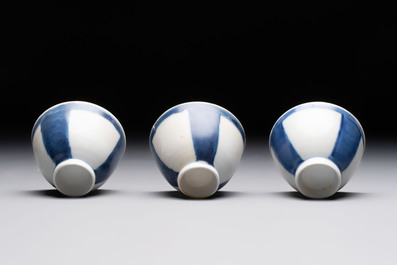 Thirteen Chinese blue and white 'Hatcher Cargo' cups and three celadon-glazed cups, Transitional period