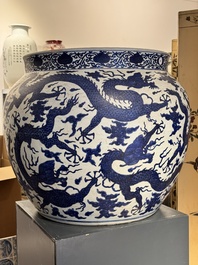 A massive Chinese blue and white 'dragon' fish bowl, Jiajing mark, 20th C.