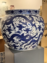 A massive Chinese blue and white 'dragon' fish bowl, Jiajing mark, 20th C.