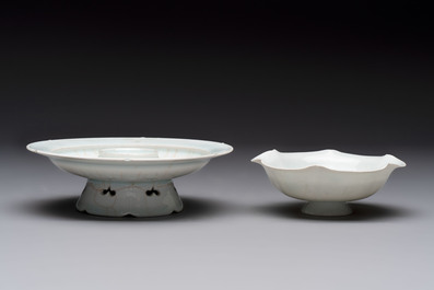 A pair of Chinese qingbai 'crane' plates and a tea bowl with stand, Song/Yuan
