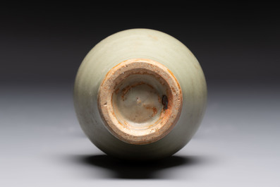 A pair of white-glazed oil lamps, a Longquan celadon vase and Yaozhou celadon box and cover, Ming/Qing