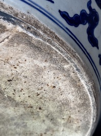 A massive Chinese blue and white 'dragon' fish bowl, Jiajing mark, 20th C.