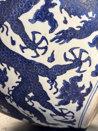 A massive Chinese blue and white 'dragon' fish bowl, Jiajing mark, 20th C.