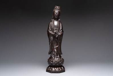 A Chinese bronze Guanyin standing on a lotus throne, 19th C.