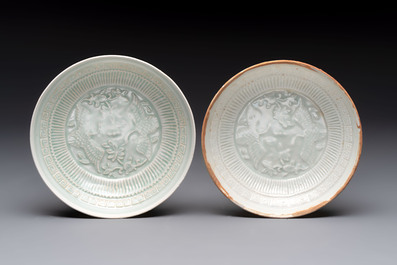 A pair of Chinese qingbai 'crane' plates and a tea bowl with stand, Song/Yuan