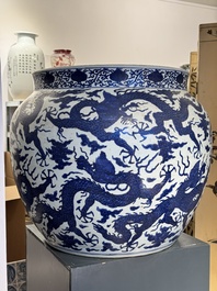 A massive Chinese blue and white 'dragon' fish bowl, Jiajing mark, 20th C.
