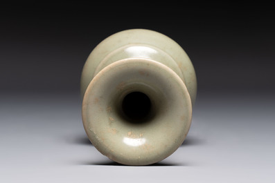 A pair of white-glazed oil lamps, a Longquan celadon vase and Yaozhou celadon box and cover, Ming/Qing
