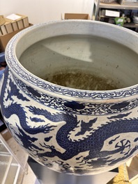 A massive Chinese blue and white 'dragon' fish bowl, Jiajing mark, 20th C.