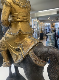 A Burmese gilt-lacquered Nat horse rider, 19/20th C.