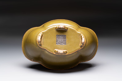 A fine Chinese teadust-glazed quadrifoil jardini&egrave;re with an openworked wooden stand, Yongzheng mark and of the period