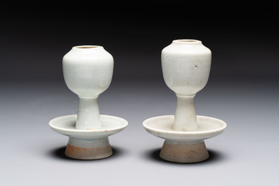 A pair of white-glazed oil lamps, a Longquan celadon vase and Yaozhou celadon box and cover, Ming/Qing