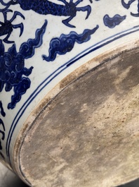 A massive Chinese blue and white 'dragon' fish bowl, Jiajing mark, 20th C.