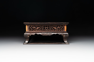 A finely carved Chinese hardwood stand, Qing