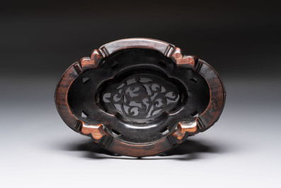 A fine Chinese teadust-glazed quadrifoil jardini&egrave;re with an openworked wooden stand, Yongzheng mark and of the period