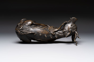 A fine Chinese bronze incense holder in the form of a qilin, Ming