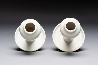 A pair of white-glazed oil lamps, a Longquan celadon vase and Yaozhou celadon box and cover, Ming/Qing