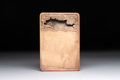 A Chinese ink stone with phoenix and carp design, Qianlong mark and possibly of the period