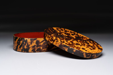A fine and rare Chinese tortoiseshell-veneered and red-lacquered oval box and cover, signed Wang Wenzhi 王文治, Qianlong mark and of the period