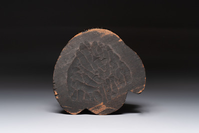 A rare and elegant Chinese Dehua blanc de Chine Guanyin on a wooden stand, Transitional period