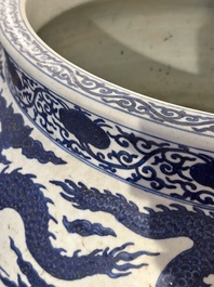 A massive Chinese blue and white 'dragon' fish bowl, Jiajing mark, 20th C.