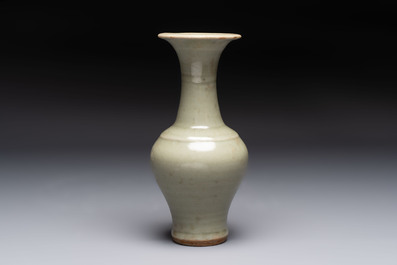 A pair of white-glazed oil lamps, a Longquan celadon vase and Yaozhou celadon box and cover, Ming/Qing