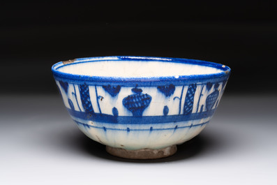 A polychrome Damascus tile, a Persian hexagonal tile and a blue-glazed bowl, 17/19th C.