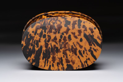 A fine and rare Chinese tortoiseshell-veneered and red-lacquered oval box and cover, signed Wang Wenzhi 王文治, Qianlong mark and of the period