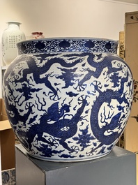 A massive Chinese blue and white 'dragon' fish bowl, Jiajing mark, 20th C.