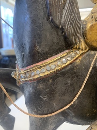 A Burmese gilt-lacquered Nat horse rider, 19/20th C.