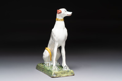 A polychrome Brussels faience greyhound, 18th C.