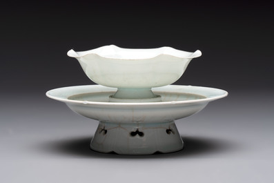 A pair of Chinese qingbai 'crane' plates and a tea bowl with stand, Song/Yuan