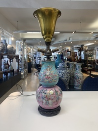 A Chinese famille rose double gourd 'Eight Immortals' vase mounted as a lamp, 19th C.