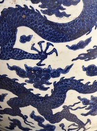 A massive Chinese blue and white 'dragon' fish bowl, Jiajing mark, 20th C.