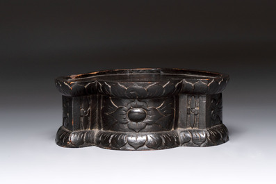 A rare and elegant Chinese Dehua blanc de Chine Guanyin on a wooden stand, Transitional period