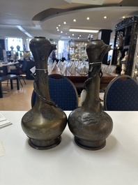 A pair of Chinese or Vietnamese gold-splashed bronze garlic-mouth 'dragon' vases, with seal mark, 17/18th C.