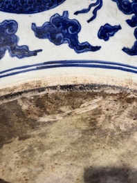 A massive Chinese blue and white 'dragon' fish bowl, Jiajing mark, 20th C.