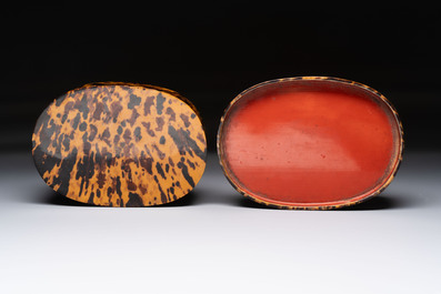 A fine and rare Chinese tortoiseshell-veneered and red-lacquered oval box and cover, signed Wang Wenzhi 王文治, Qianlong mark and of the period