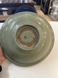 A Chinese Longquan celadon plate with floral design, Yuan/Ming