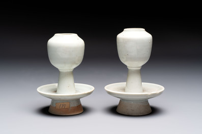 A pair of white-glazed oil lamps, a Longquan celadon vase and Yaozhou celadon box and cover, Ming/Qing