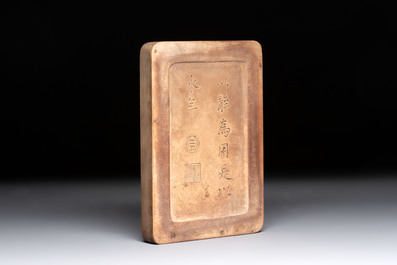 A Chinese ink stone with phoenix and carp design, Qianlong mark and possibly of the period