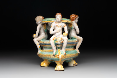 An Italian maiolica triangular salt with winged cherubs, Deruta, 17th C.