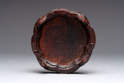 A pair of Chinese polychrome 'persimmons' groups on wooden stands, 19th C.