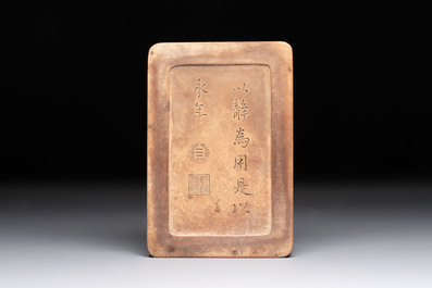 A Chinese ink stone with phoenix and carp design, Qianlong mark and possibly of the period