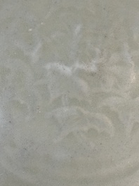 A Chinese Longquan celadon plate with floral design, Yuan/Ming