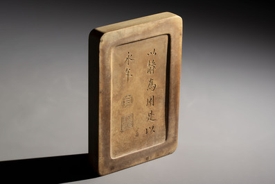 A Chinese ink stone with phoenix and carp design, Qianlong mark and possibly of the period