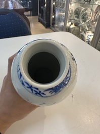 A Chinese blue and white garniture of five vases with river landscapes, 19th C.