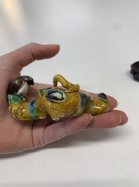 Six Chinese porcelain and glass brush rests, 19/20th C.