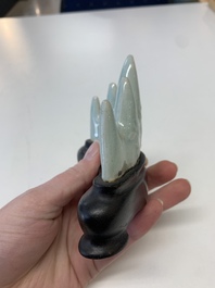 Six Chinese porcelain and glass brush rests, 19/20th C.