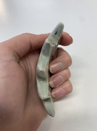 Six Chinese porcelain and glass brush rests, 19/20th C.